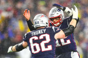 Joe Thuney And Tom Brady Wallpaper