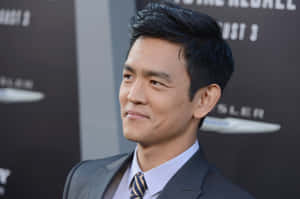 John Cho: A Man Of Many Talents Wallpaper