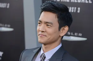 John Cho: A Man Of Many Talents Wallpaper