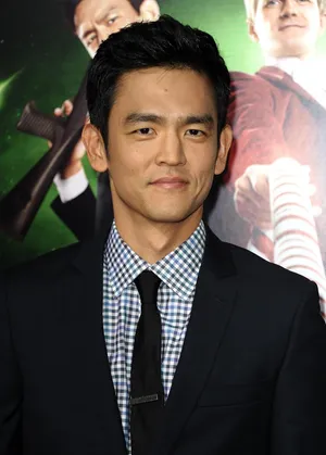 John Cho Poses During A Photoshoot Wallpaper