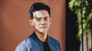 John Cho Posing For A Stylish Photoshoot Wallpaper