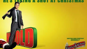 John Cho Smiling In A Stylish Black Suit Wallpaper