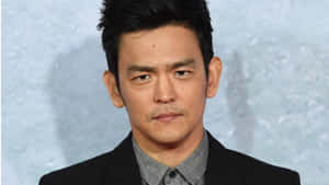 John Cho: The Hollywood Star In Action Wallpaper