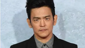 John Cho: The Hollywood Star In Action Wallpaper