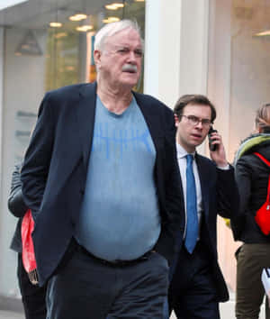 John Cleese Casual Walk Wallpaper