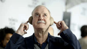 John Cleese Potato Phone Pose Wallpaper