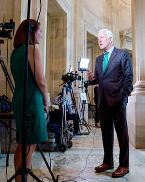 John Cornyn Answering Questions Wallpaper