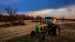John Deere Tractor At Sundown Wallpaper
