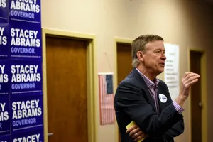 John Hickenlooper Speaking And Making Hand Gestures Wallpaper