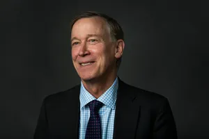 John Hickenlooper With A Dark Gray Background Wallpaper