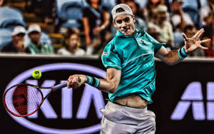 John Isner In Action On Tennis Court Wallpaper