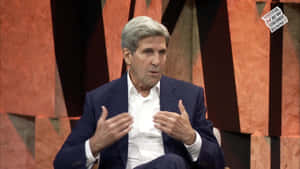 John Kerry Discussing Governance Challenges Wallpaper