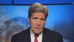 John Kerry In The Spotlight Participating In A Meet The Press Interview Wallpaper