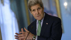 John Kerry Speaking To The Press Wallpaper