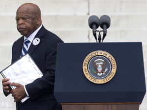 John Lewis Stepping Away From The Podium Wallpaper