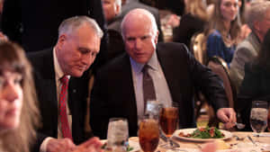 John Mccain Whispering To Jon Kyl Wallpaper