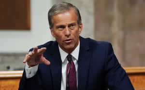 John Thune Holding Out Hand Wallpaper