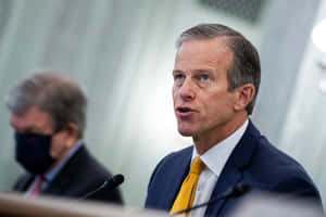 John Thune Speaking Into Microphone Wallpaper