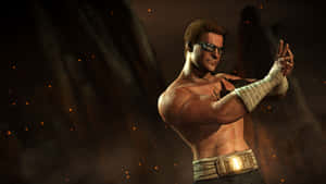 Johnny Cage Leaning Against A Brick Wall In A Battle-ready Pose Wallpaper