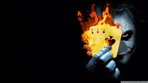 Joker With Burning Ace Cards Wallpaper