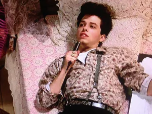 Jon Cryer, The Emmy-winning Actor, Smiles Warmly In A Studio Wallpaper