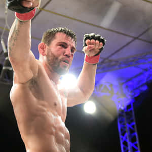 Jon Fitch Celebrating Win Against Brian Foster Wallpaper