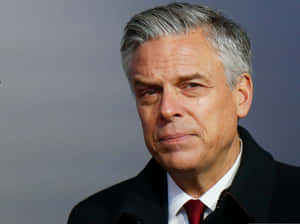 Jon Huntsman Against A Gray Backdrop Wallpaper