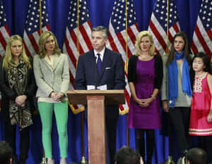 Jon Huntsman Speaking On Podium Wallpaper