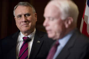 Jon Kyl Staring At John Mccain Wallpaper