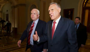 Jon Kyl Walking With John Mccain Wallpaper