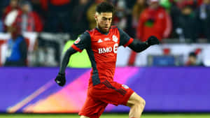 Jonathan Osorio Wearing Toronto Fc Uniform Wallpaper