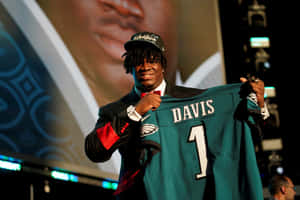 Jordan Davis Holding Eagles Jersey Wallpaper