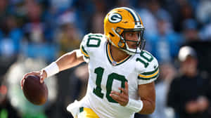 Jordan Love Green Bay Packers Quarterback Action Wallpaper