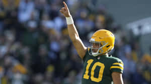 Jordan Love Green Bay Packers Quarterback Signal Wallpaper