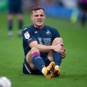 Jordan Morris During Swansea City Injury Wallpaper