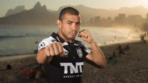 José Aldo Meditating On A Sunset Beach. Wallpaper