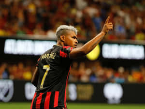 Josef Martinez Striking A Goal For Atlanta United Fc Wallpaper