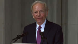 Joseph Lieberman Speakingat Podium Wallpaper