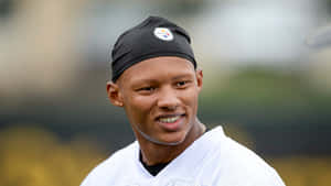 Joshua Dobbs Smiling During Practice Wallpaper