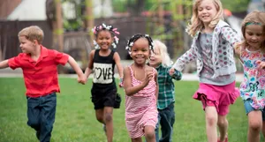 Joyful Children Playing Outdoors Wallpaper