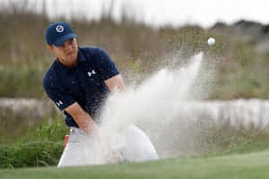 Jt Poston Hitting Golf Ball Intensely Wallpaper