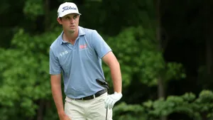 Jt Poston Holding Golf Club Wallpaper