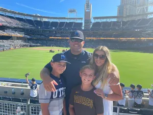 Jubilant Little League Baseball Team Celebrating Victory Wallpaper