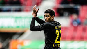 Jude Bellingham Borussia Dortmund Action Wallpaper