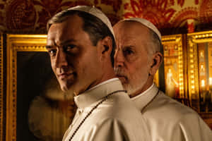 Jude Law As The Young Pope - Serious Contemplation Wallpaper