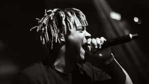 Juice Wrld Lights Up The Stage With An Electrifying Concert Performance! Wallpaper