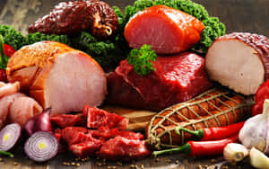 Juicy And Delicious Red Meat On A Wooden Board Wallpaper