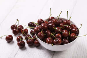 Juicy Black Cherries Ready To Eat Wallpaper