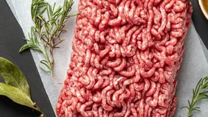 Juicy Red Meat On Cutting Board Wallpaper