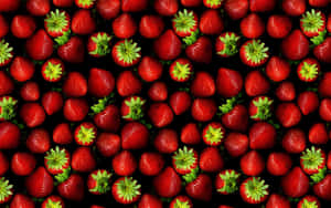 Juicy Red Strawberry On A Blurred Background Wallpaper